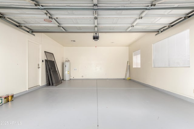 garage with water heater and a garage door opener