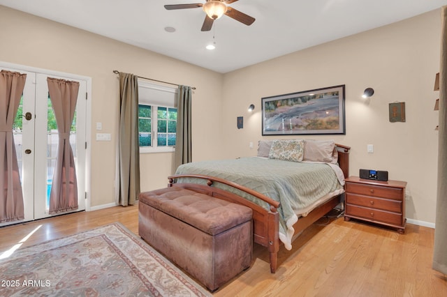 bedroom featuring access to exterior, ceiling fan, and light hardwood / wood-style flooring