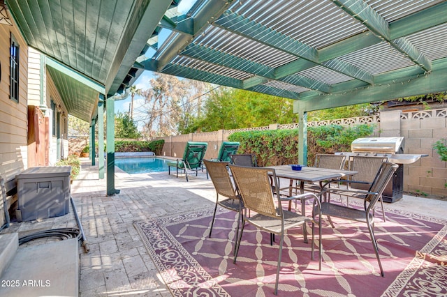 view of patio / terrace featuring a fenced in pool and a pergola