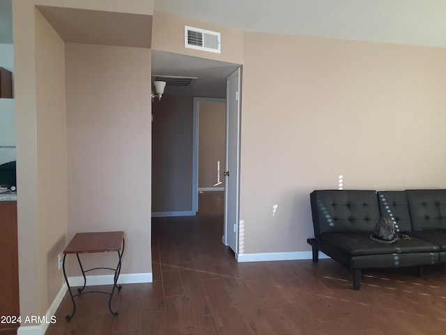 sitting room with dark hardwood / wood-style floors