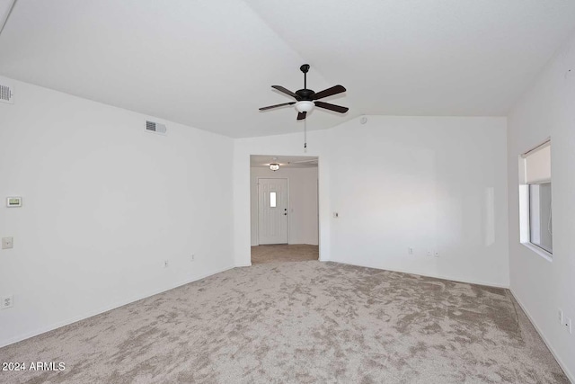 unfurnished room with carpet flooring, ceiling fan, and lofted ceiling