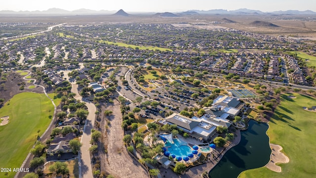 birds eye view of property featuring a water and mountain view