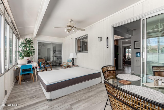 sunroom / solarium with beam ceiling