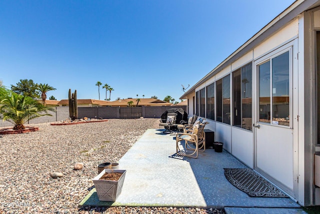 view of yard with a patio area and a fenced backyard