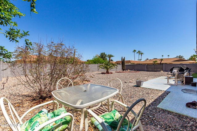 view of yard with a fenced backyard and a patio
