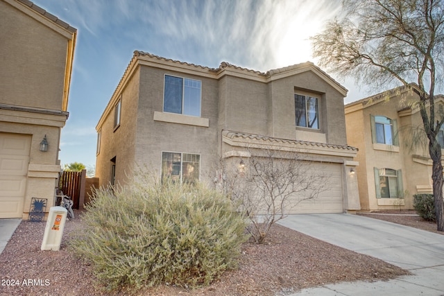 view of front of property with a garage