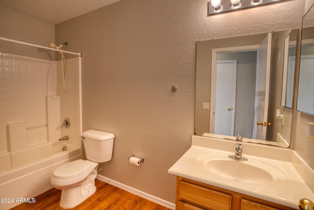 full bathroom featuring shower / bath combination, vanity, toilet, and wood-type flooring