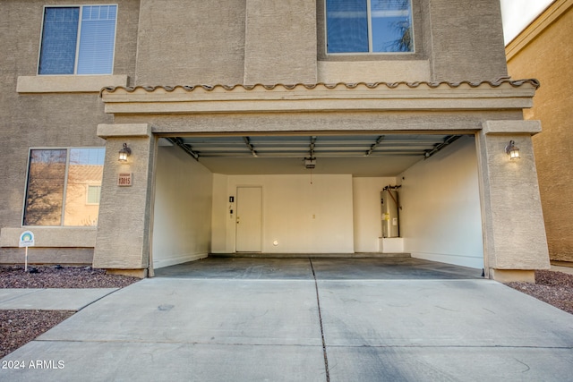 garage featuring water heater