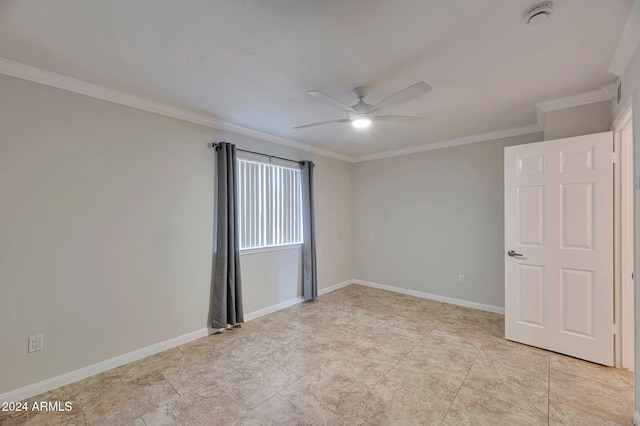 unfurnished room with ceiling fan and crown molding