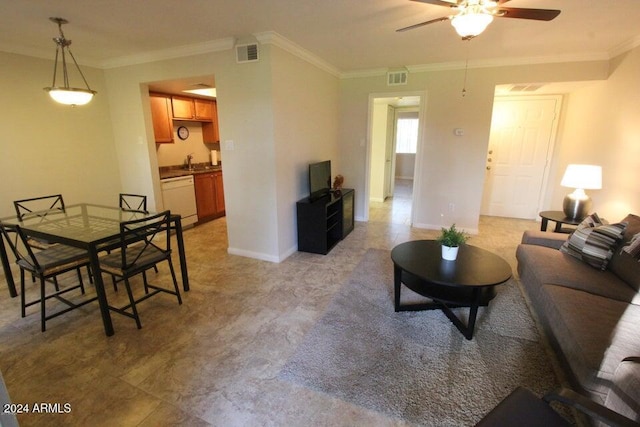 living room featuring ceiling fan, sink, and crown molding