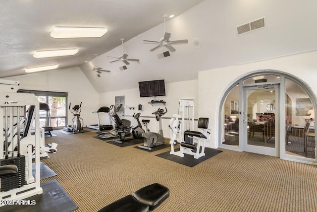 exercise room with ceiling fan, lofted ceiling, french doors, and carpet flooring