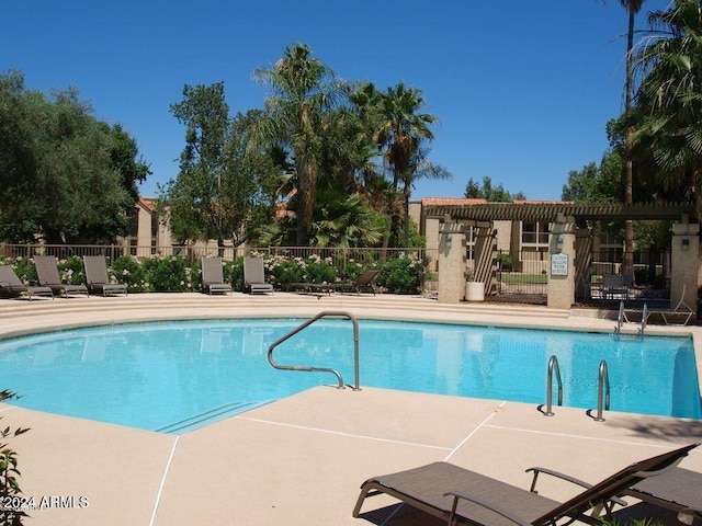 view of pool featuring a patio area