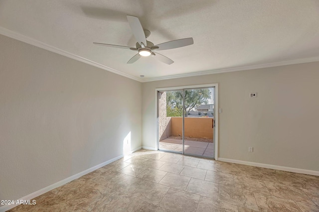 spare room with ceiling fan and ornamental molding