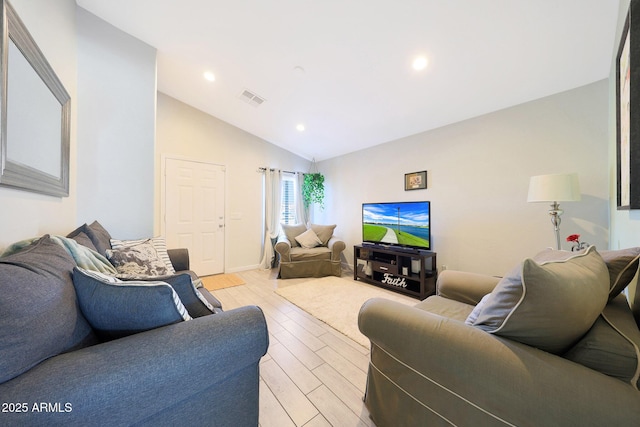11207 W Turney Ave, Phoenix, AZ 85037 - living area with vaulted ceiling, light wood-type flooring, and recessed lighting