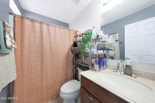 11207 W Turney Ave, Phoenix, AZ 85037 - bathroom featuring toilet, vanity, and a shower with curtain
