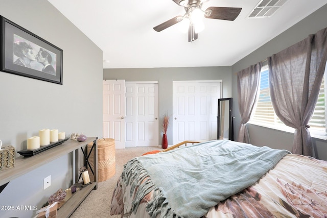 11207 W Turney Ave, Phoenix, AZ 85037 - bedroom featuring carpet, two closets, and ceiling fan