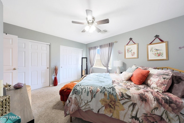 11207 W Turney Ave, Phoenix, AZ 85037 - carpeted bedroom featuring multiple closets and a ceiling fan