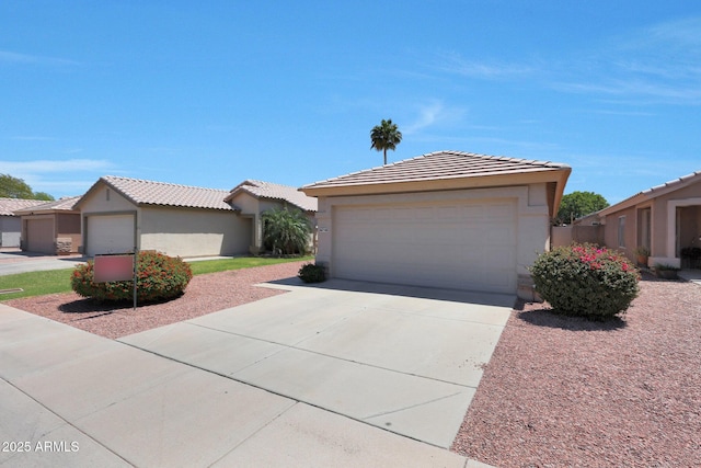 11207 W Turney Ave, Phoenix, AZ 85037 - ranch-style home with stucco siding, concrete driveway, and a tile roof