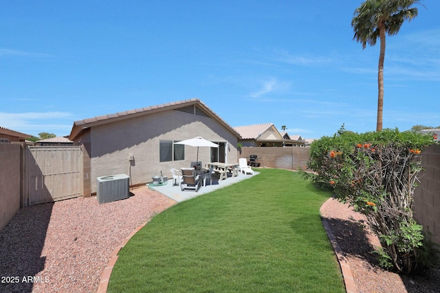 11207 W Turney Ave, Phoenix, AZ 85037 - back of property featuring stucco siding, a patio area, and central AC
