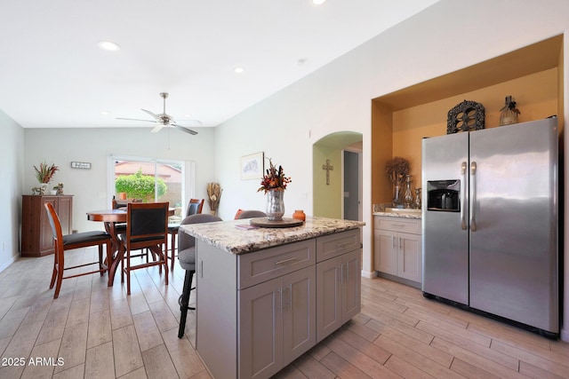 11207 W Turney Ave, Phoenix, AZ 85037 - kitchen with stainless steel fridge with ice dispenser, gray cabinets, light wood-style flooring, a ceiling fan, and recessed lighting