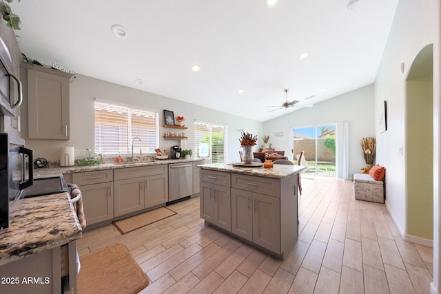 11207 W Turney Ave, Phoenix, AZ 85037 - kitchen featuring dishwasher, gray cabinetry, a sink, vaulted ceiling, and healthy amount of natural light