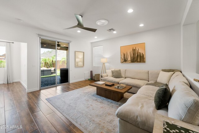 1812 E Parkside Ln E, Phoenix, AZ 85024 - living room featuring plenty of natural light, a ceiling fan, wood finished floors, and recessed lighting
