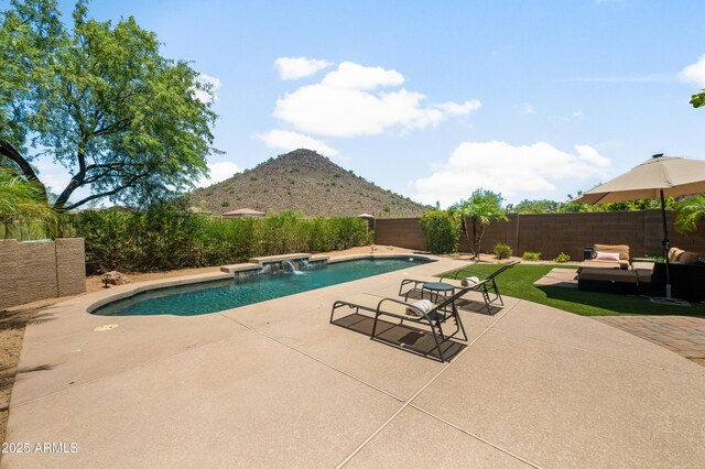 1812 E Parkside Ln E, Phoenix, AZ 85024 - view of pool with a mountain view, a fenced backyard, a patio, and an outdoor living space