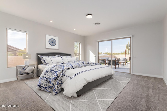 bedroom featuring recessed lighting, light colored carpet, visible vents, access to exterior, and baseboards