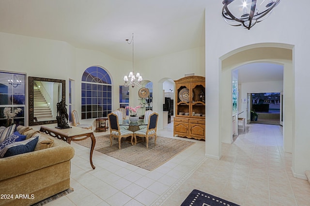 tiled dining space featuring a chandelier