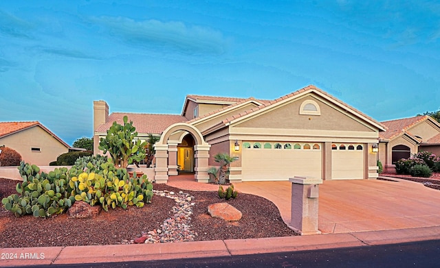 view of front of property featuring a garage