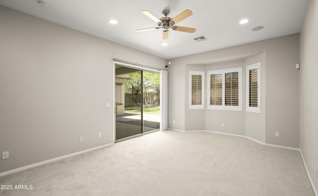 carpeted spare room with a ceiling fan, baseboards, recessed lighting, and a smoke detector