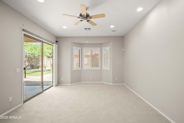 unfurnished room featuring light carpet, ceiling fan, recessed lighting, and baseboards