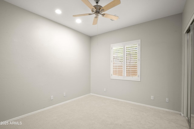 empty room with a ceiling fan, light carpet, baseboards, and recessed lighting