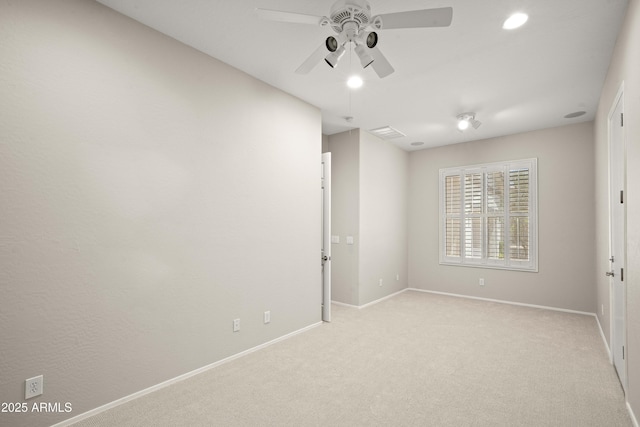 spare room featuring ceiling fan, baseboards, carpet floors, and recessed lighting