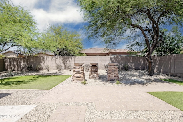 view of patio featuring a fenced backyard
