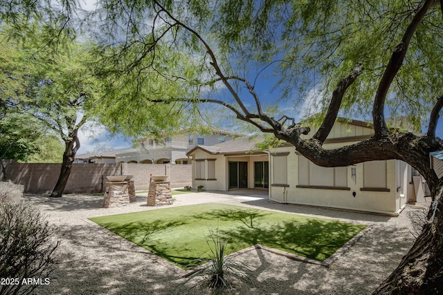 back of property featuring stucco siding and a patio area