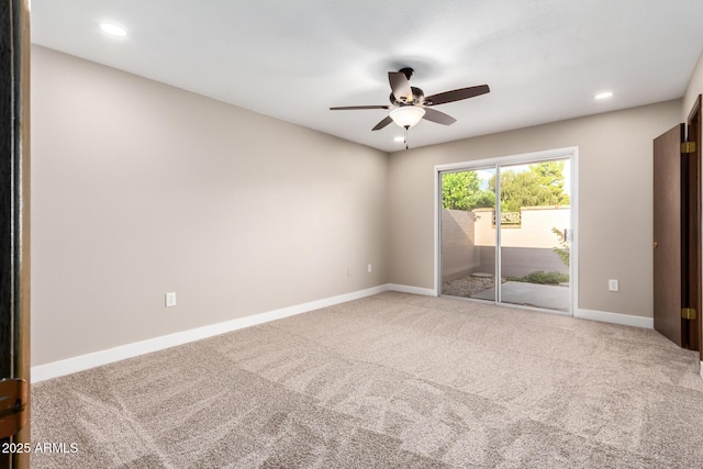 carpeted empty room with ceiling fan