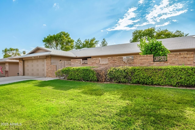 ranch-style house with a garage and a front lawn