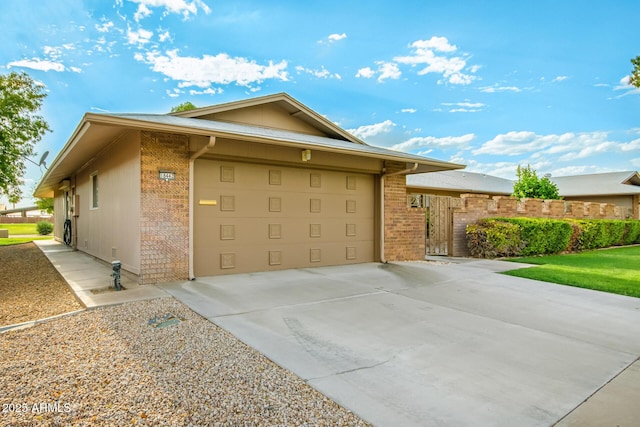 view of side of property featuring a garage