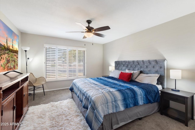 bedroom featuring light carpet and ceiling fan