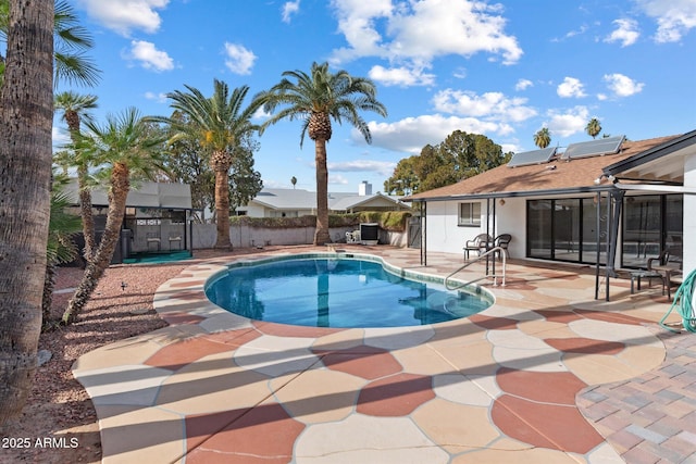 view of pool featuring a patio