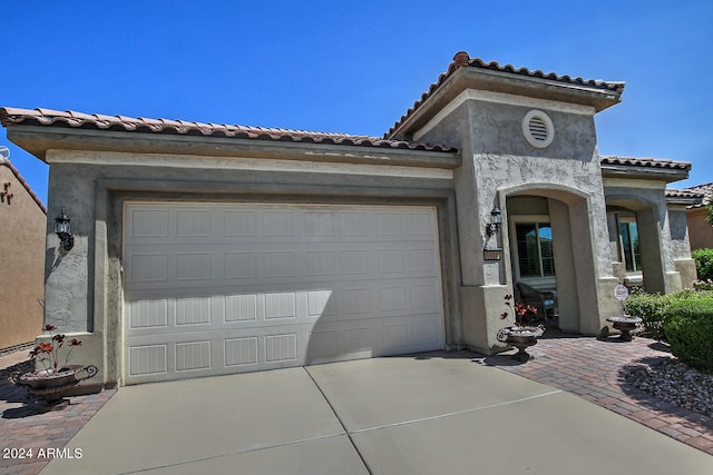 view of front of home featuring a garage