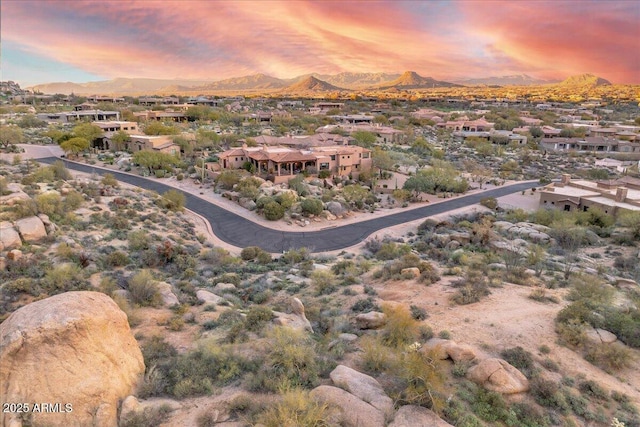 birds eye view of property featuring a residential view and a mountain view