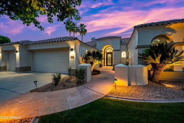 1724 W Blue Ridge Way, Chandler, AZ 85248 - mediterranean / spanish-style house with a garage, stucco siding, a tiled roof, and driveway