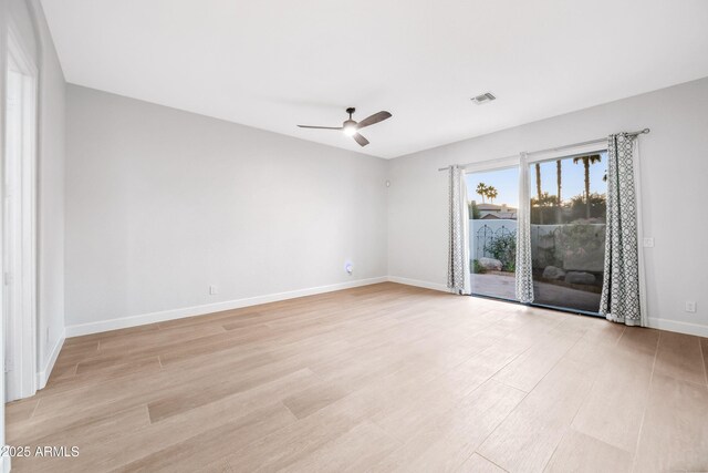 1724 W Blue Ridge Way, Chandler, AZ 85248 - spare room with ceiling fan, light wood-style floors, and baseboards