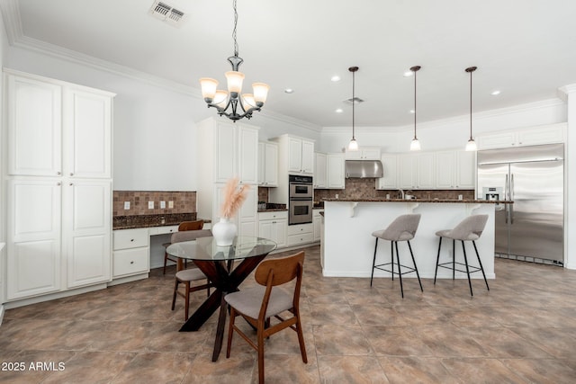 13034 W Krall Ct, Glendale, AZ 85307 - kitchen with stainless steel appliances, dark countertops, crown molding, decorative backsplash, and under cabinet range hood