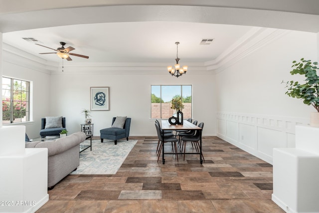 13034 W Krall Ct, Glendale, AZ 85307 - dining area featuring ornamental molding, a chandelier, wood finished floors, and a ceiling fan