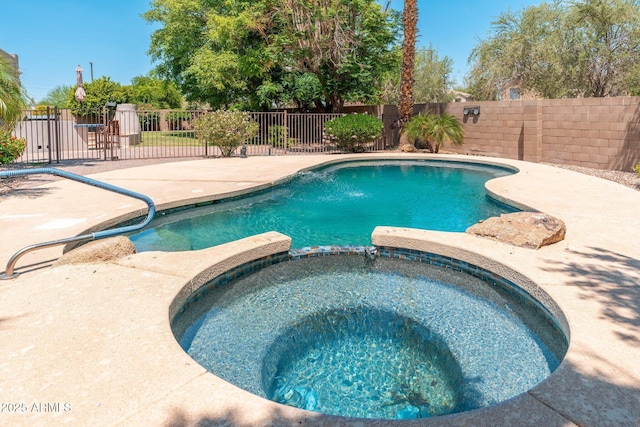 13034 W Krall Ct, Glendale, AZ 85307 - view of swimming pool featuring a patio area and a pool with connected hot tub
