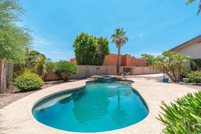 13034 W Krall Ct, Glendale, AZ 85307 - view of swimming pool with a fenced backyard, a patio, and a pool with connected hot tub