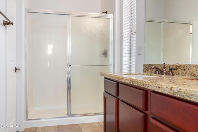 4548 E Carob Dr, Gilbert, AZ 85298 - full bathroom with a shower stall, vanity, and tile patterned floors